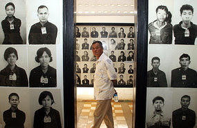A man visits Tuol Sleng genocide museum in Phnom Penh. [AFP]