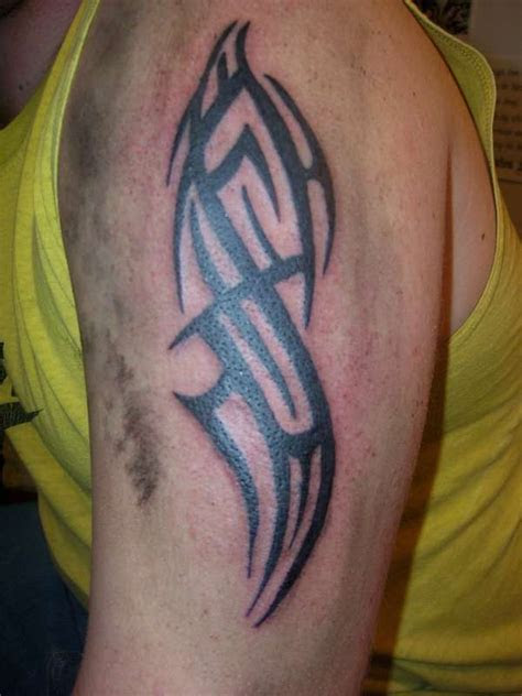 Tribal Tattoos Upper Arm - All About Tatoos Ideas