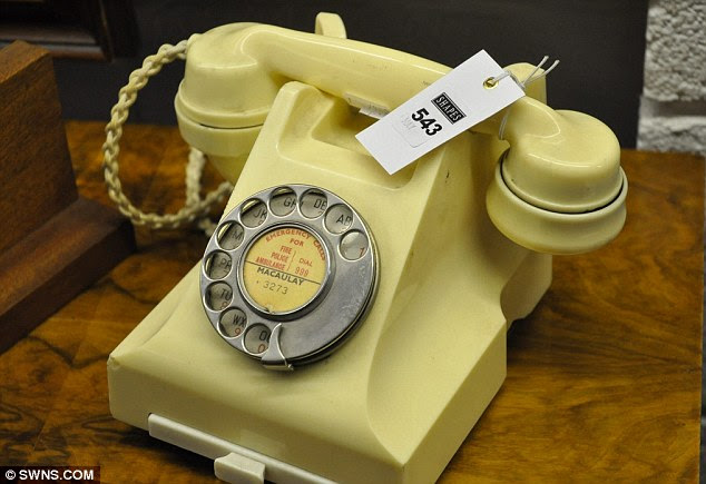 For sale: Scottish artist Jack Vettriano is selling the contents of his studio flat in Fife - which includes everyday items featured in his work. This phone is thought to be the same as was featured in The Arrangement