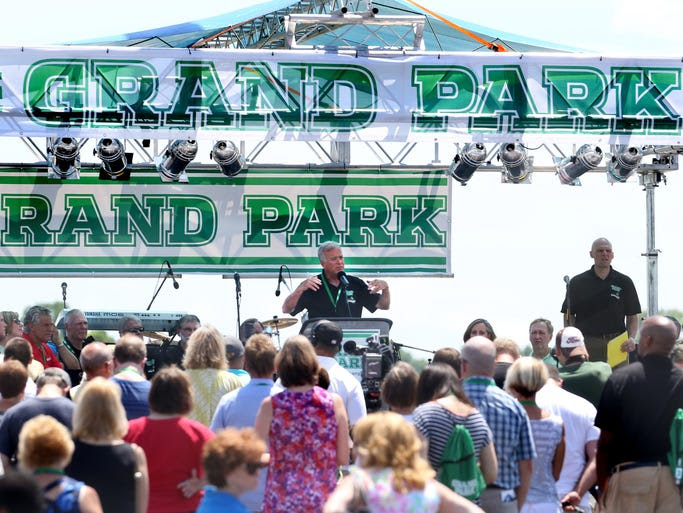 Westfield Mayor Andy Cook makes comments to the hundreds of people that turned out for the grand opening ceremony for Westfield's Grand Park, which, when finished, will be the country's largest multipurpose youth sports complex, on Saturday, June 21, 2014. The three-day celebration that began on Friday includes live music, a Ferris wheel, food and fireworks, and of course a youth sports tournament. The facility has 31 multi-use soccer/football fields and 26 baseball/softball diamonds throughout 400 acres.