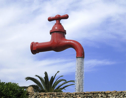 Magic tap fountain in Santa Galdana, Menorca