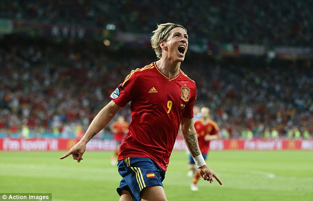 Champions! Torres scored the Spaniards' third as the Italians were blown away in Kiev 