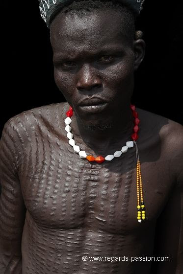 Africa | Nyangatom warrior | ©Benoit Feron