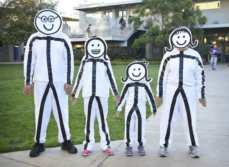 Our Stick Family Halloween costume 2013. White clothes, black duct tape, foam board faces painted on with acrylic black paint with eyes cut out.  There are even braces on the face of my Middle School kid. Fun for all!