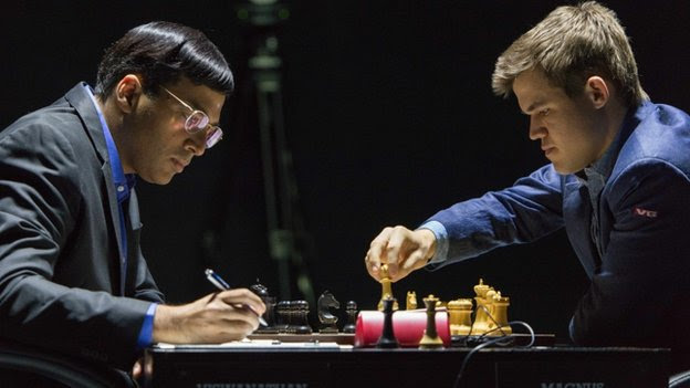 Norway's Magnus Carlsen plays against India's former world champion Vishwanathan Anand