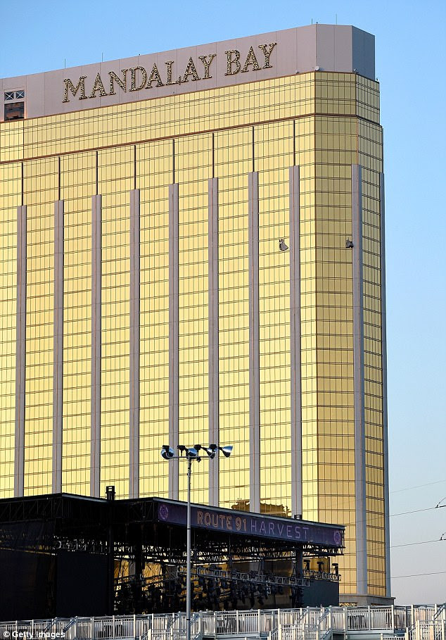 Two broken windows on the 32nd floor of the Mandalay Bay Hotel could be clearly seen from the Route 91 Harvest stage on Monday morning in the aftermath of the deadly shooting