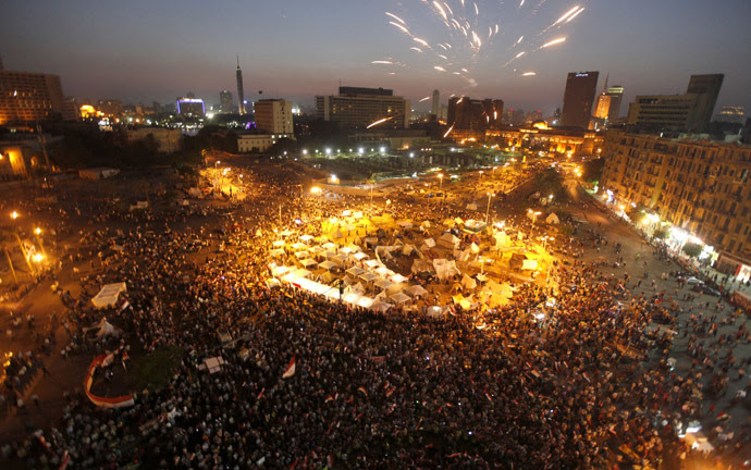 Protesters opposing Egyptian President Mohamed Morsi shout slogans and set off fireworks during a protest in Tahrir square in Cairo June 29, 2013. (Reuters)