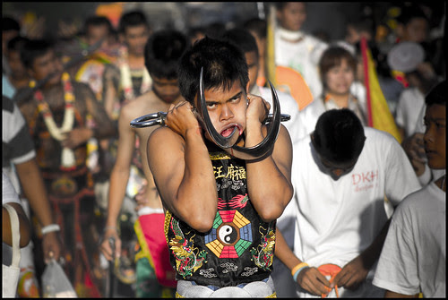 Gory pierced face at the Jui Tui procession on October 11th 2013