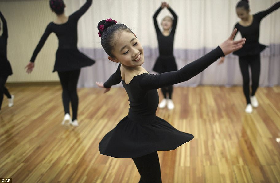 North Korean schoolgirls attend a dance class at the Mangyongdae Children's Palace ahead of the Day of the Sun