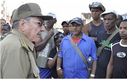 Republic of Cuba President Raul Castro visiting Hurricane Sandy affected areas in Santiago de Cuba. 11 people were killed during the storm. by Pan-African News Wire File Photos