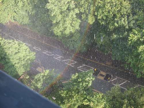 Rainbow crosses the road.
