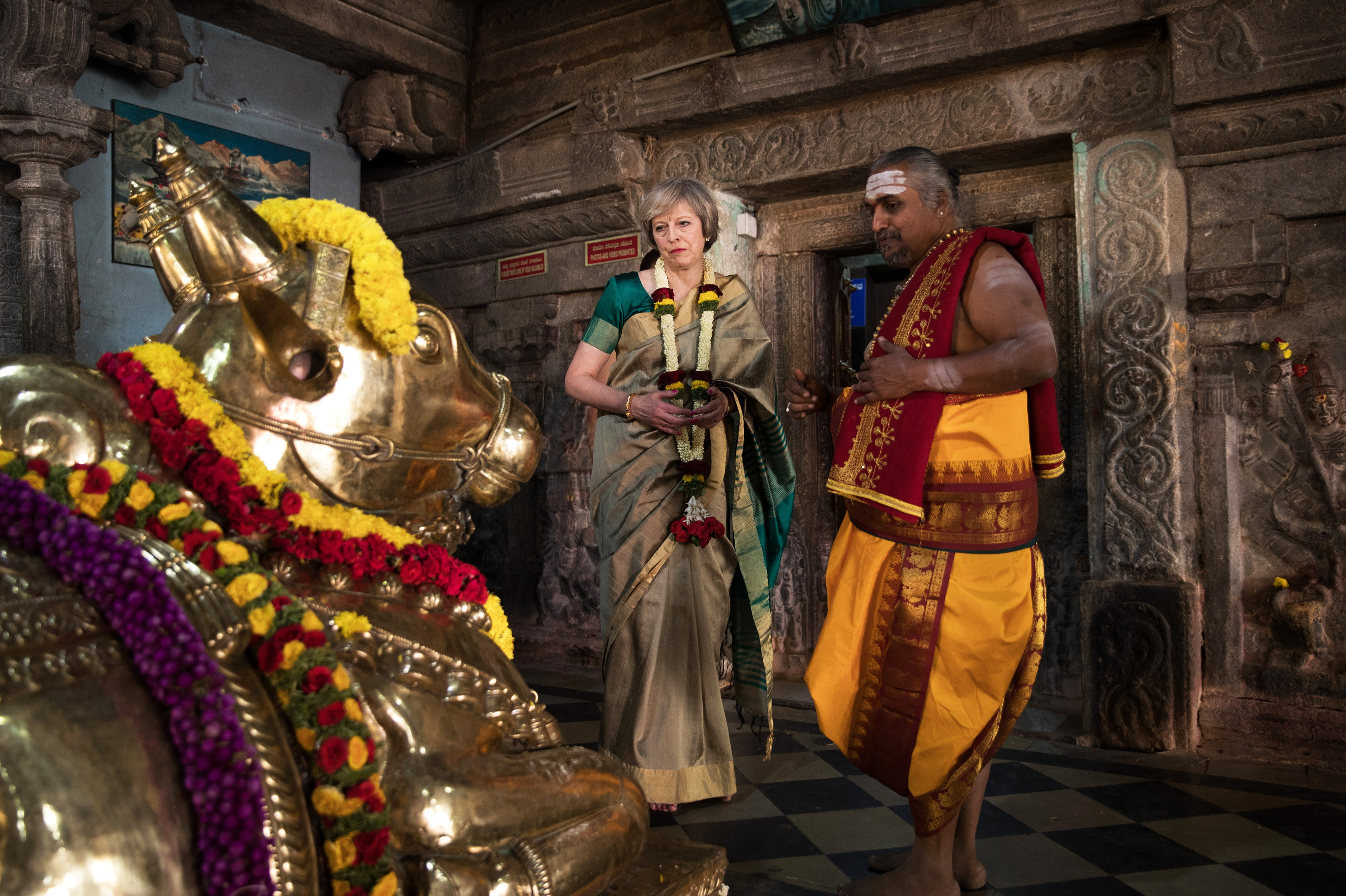 British Prime Minister Theresa May is welcomed to the Sri Someshwara Temple on November 8, 2016 in Bangalore, India. Mrs May is in India on a two day trade mission to reconnect the UK with the Commonwealth during her first trip since taking office. Yesterday the Prime Minister met with Indian Prime Minister Narendra Modi.  (Photo by Dan Kitwood/Getty Images)