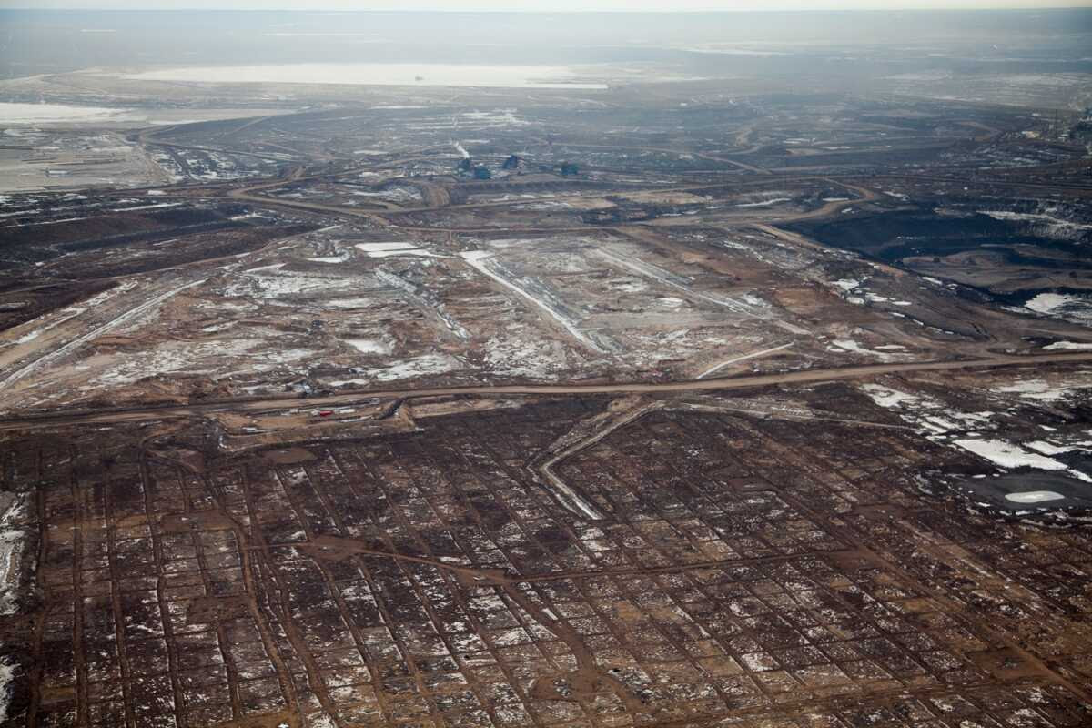 Clearing, dewatering, and seismic grid over the once boreal forest. Syncrude mining site, Alberta, Canada.
