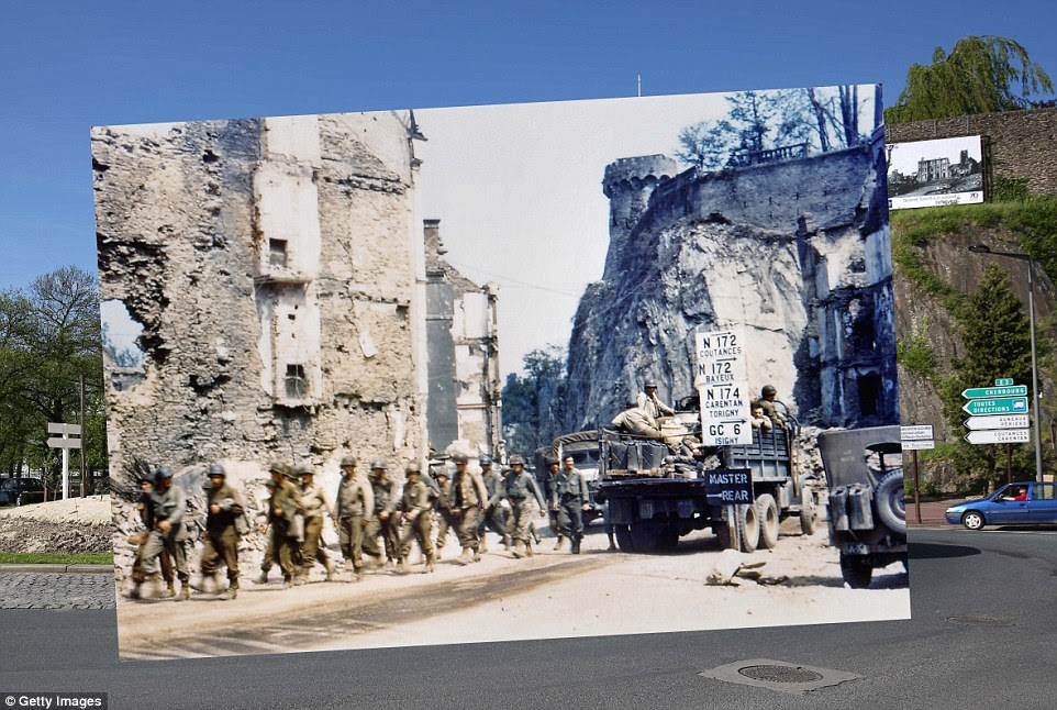  Saint Lo, France. 1944: A group of American soldiers march through the town which was  almost totally destroyed by Allied bombers, while a jeep drives past carrying supplied and soldiers. 2014: Today the area has been turned into a roundabout