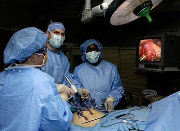 Physicians perform laparoscopic stomach surger...