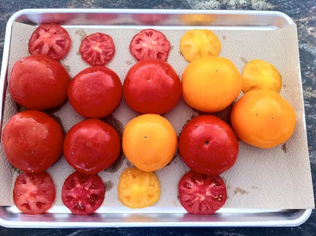 Tomatoes Draining on Lined Baking Sheet
