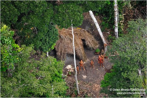 Members of the “uncontacted” Amazon tribe in western Brazil near the Peruvian border.