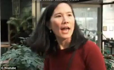 Help: An Asian woman shouts for security when she notices someone acting suspiciously in a mall