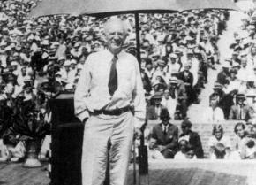 Upton Sinclair stands before a crowd during his campaign for governor of California
