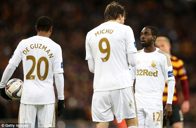 It's mine: De Guzman and hat-trick hunter Dyer argued over who would take the penalty