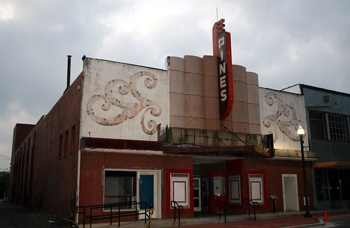 pines theater in morning on cloudy day