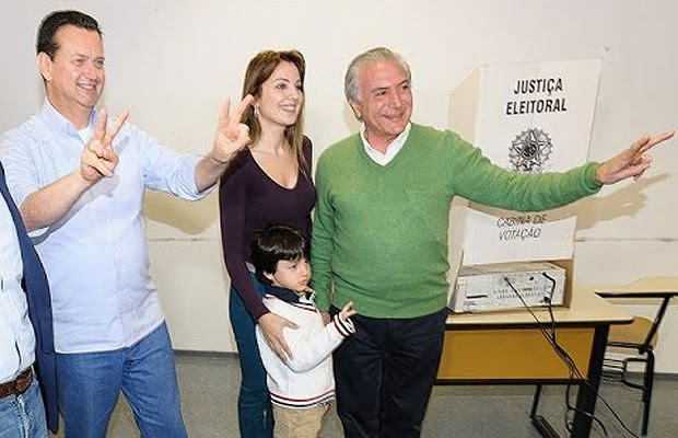 Michel Temer vota nas últimas eleições ao lado da mulher e do filho pequeno (Foto: Reprodução/YouTube) Michel Temer vota nas últimas eleições ao lado da mulher e do filho pequeno (Foto: Reprodução/YouTube)