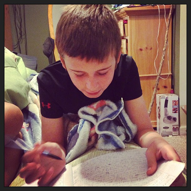 My 9 yr old reading to me from the journal he kept on his CO vacation.
