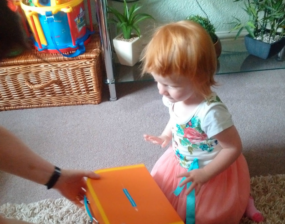 Marianna with the Little Passports Early Explorers Suitcase