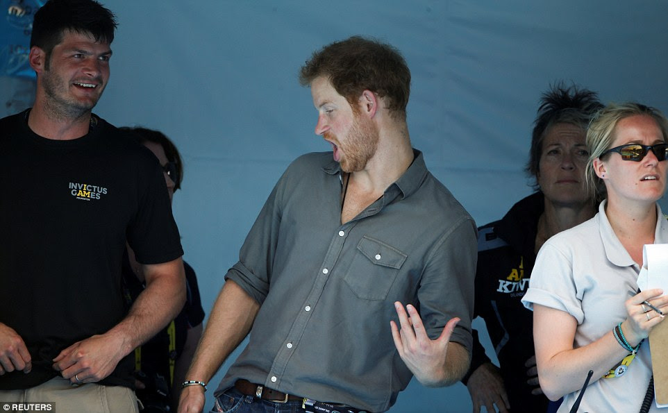 Prince Harry played the joker as he mimed playing a guitar while celebrating another gold medal for the Brits at the Invictus Games