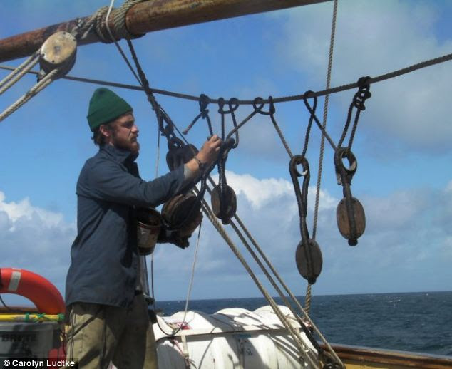 Working together: Third mate Dan Cleveland doing some maintenance on the rigging of the Bounty in 2011