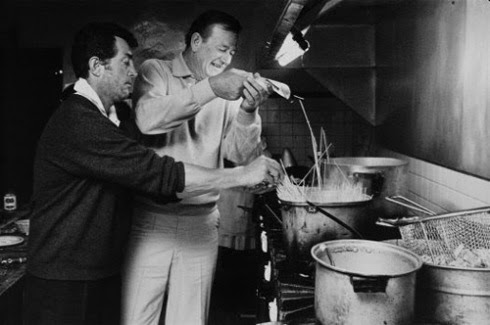 "Don't dump it in! We're supposed to add the pasta slowly!" Transman yells at his father, played by John Wayne.