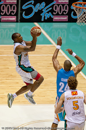 Will Blalock elevates nicely against Ira Clark - Gold Coast Blaze v Townsville Crocodiles NBL Basketball, Friday 17 December 2010 - National Basketball League, Gold Coast Convention & Exhibition Centre, Queensland, Australia. Photos by Des Thureson. Will Blalock elevates nicely against Ira Clark - Gold Coast Blaze v Townsville Crocodiles NBL Basketball, Friday 17 December 2010 - National Basketball League, Gold Coast Convention & Exhibition Centre, Queensland, Australia. Photos by Des Thureson.