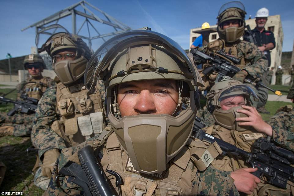 Lance Corporal Jose Nieves tests a Step In Visor and Low Profile Mandible during the technology testing exercise