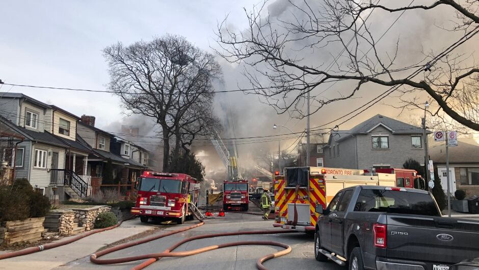 1 person in life-threatening condition after firefighters rescue 11 from 4-alarm fire blaze