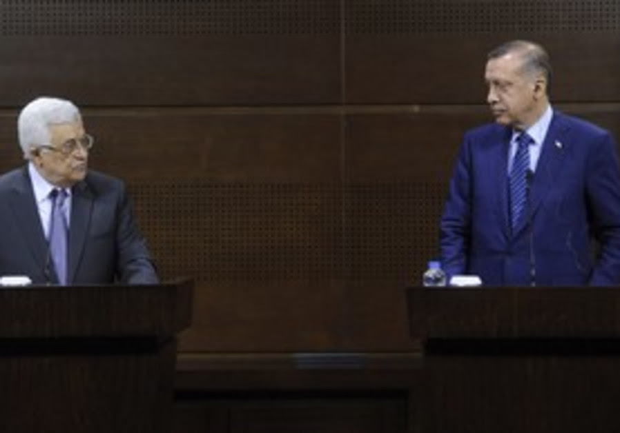 Abbas (L) and Erdogan in Ankara, Friday.