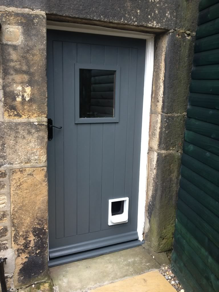 Front door in Farrow and Ball Down Pipe