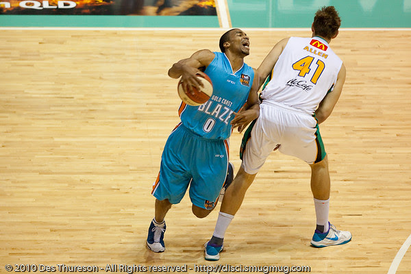 Blaze import Darryl Hudson does a good job of selling the foul committed by former St Mary's player Ben Allen - Gold Coast Blaze v Townsville Crocodiles NBL Basketball, Friday 17 December 2010 - National Basketball League, Gold Coast Convention & Exhibition Centre, Queensland, Australia. Photos by Des Thureson. Blaze import Darryl Hudson does a good job of selling the foul committed by former St Mary's player Ben Allen - Gold Coast Blaze v Townsville Crocodiles NBL Basketball, Friday 17 December 2010 - National Basketball League, Gold Coast Convention & Exhibition Centre, Queensland, Australia. Photos by Des Thureson.