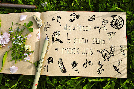 Download Free Sketchbook Mockup On The Grass Psd Mockup PSD Mockup Template