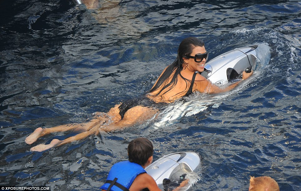 Big kick: The reality star appeared to be having a blast on some small jet skis