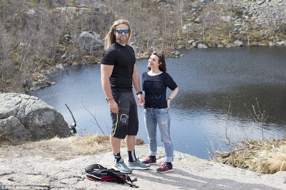 Looking up: Most people gaze adoringly up at Lasse, who measures in at six-foot-six, and Isabel at five-foot-two was no exception. He says: 'I was always a big boy, so I was captain of the football team'