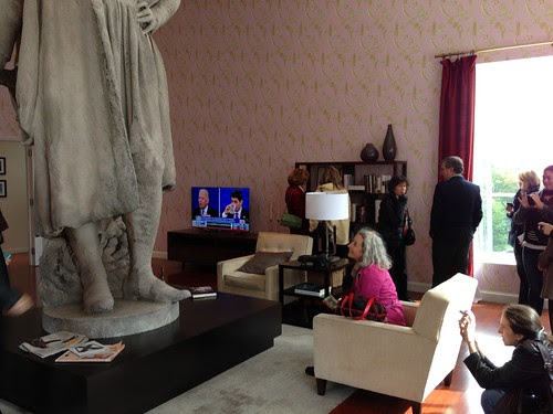 In the "living room," Columbus's pediment at left