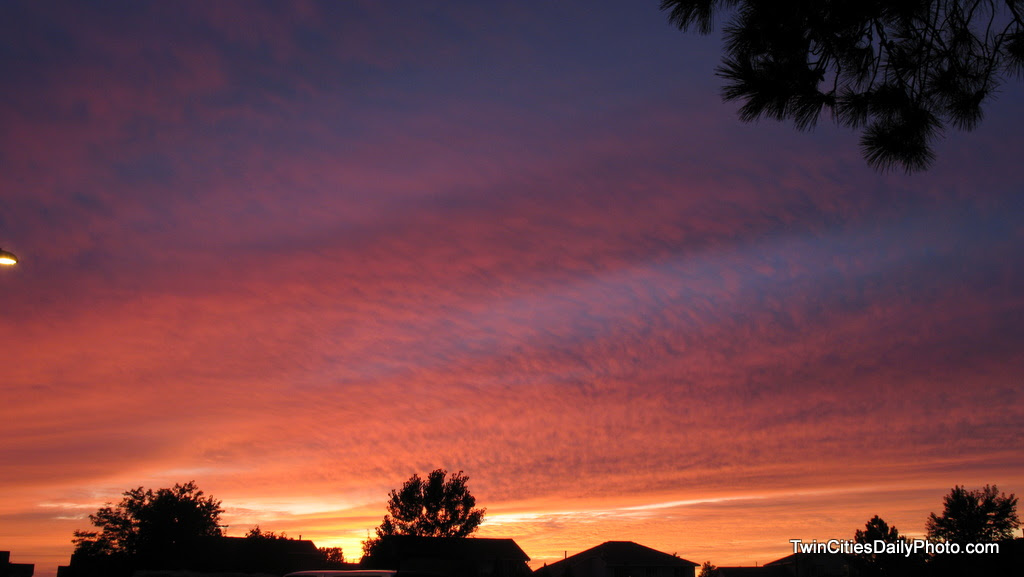 What an amazing color the sky was tonight. I was at my son's football scrimmage for about two hours, with the sunset during the evening. Thankfully I had a clearing to get a photo or two of it.