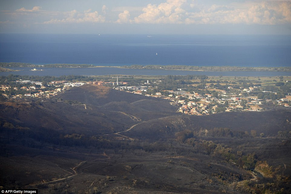 An aerial photograph shows the fire devastated landscape in Biguglia, on the French Mediterranean island of Corsica