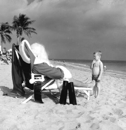 Child Looking at Santa on the Beach