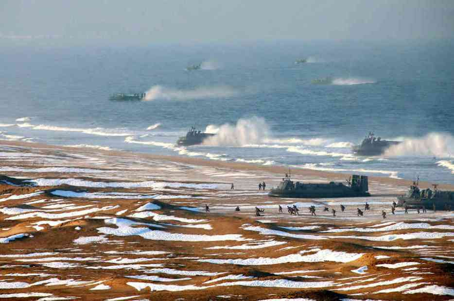 North Korea issued this photo last week, which appears to show a flotilla of landing craft assaulting a beach. Upon closer inspection, many of these vessels are superimposed on the image.
