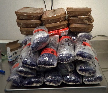 More than $390K worth of cocaine and meth were removed from a smuggling vehicle stopped by officers at the DeConcini crossing