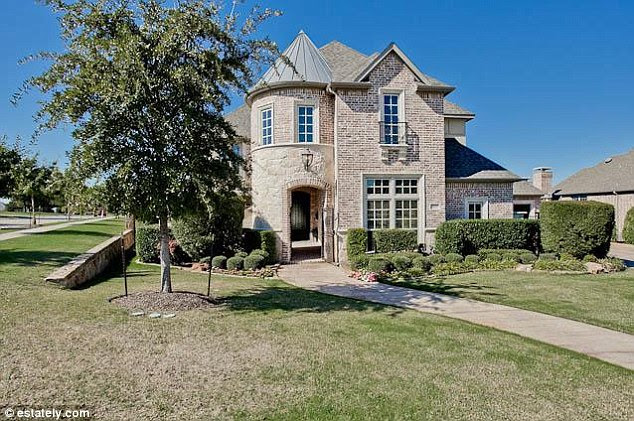 Tiny castle: This five-bedroom in Lewisville, Texas may look small but packs a punch with an additional theatre room and game room while listed for $787,000