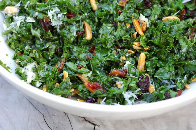 Massaged kale salad with homemade dried cherries, toasted almonds and Parmesan cheese by Eve Fox, the Garden of Eating blog, copyright 2013