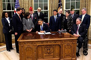 President Barack Obama signs an executive orde...