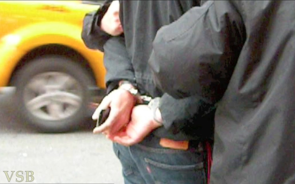 Screen shot handcuffs crop